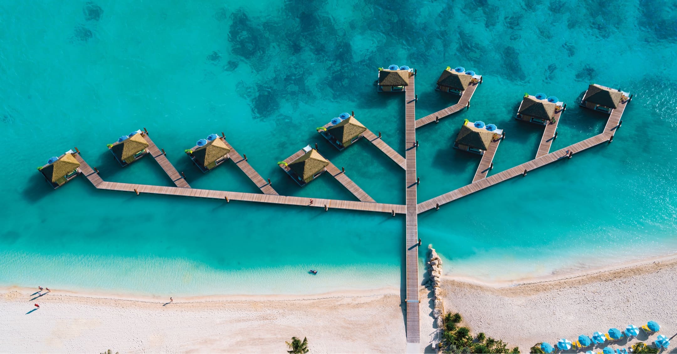 Aluminum floating docks with floating huts in turquoise Caribbean sea