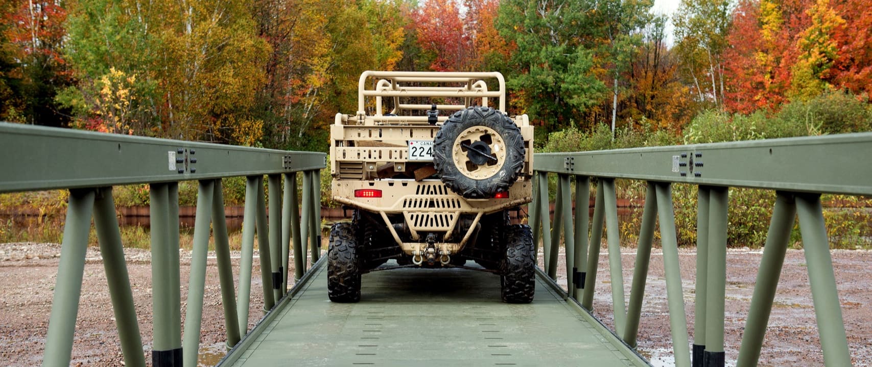 Military UTV crossing army green aluminum tactical bridge