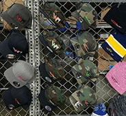 Woolf Merchandise on a rack in their store